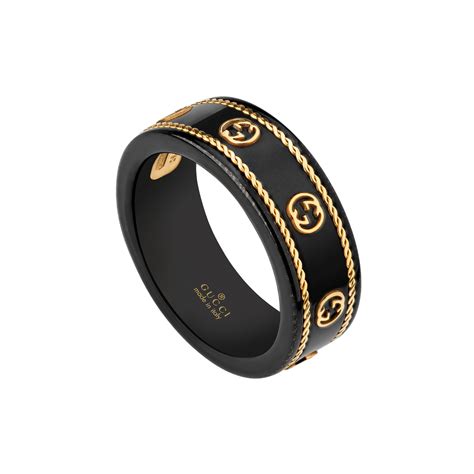 gucci black and gold ring.